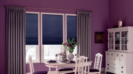 Contemporary dining room with grey-ish purple drapes Contemporary dining room with grey-ish purple drapes, bluish purple cellular shades, purple walls and white furnishings